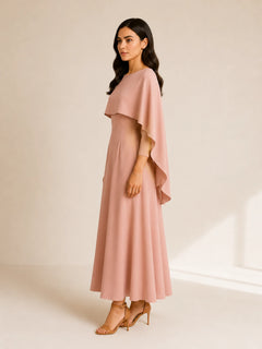 WAROODI Amina Cape Maxi in blush pink with draped cape detail, side view