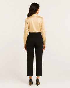 Back view of WAROODI Celina Satin Cowl Shirt in champagne with long sleeves and tailored styling