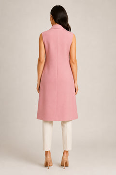 Back view of WAROODI Rose Blush Sleeveless Prestige Coat with clean structured finish