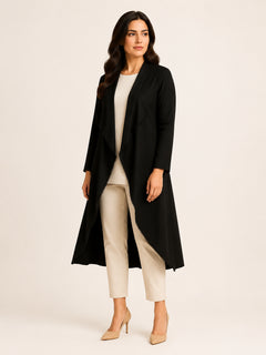 Midnight black long flow coat by WAROODI with open-front drape, three-quarter view