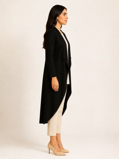 WAROODI Liana Flow Coat in midnight black with fluid long-line silhouette, side view