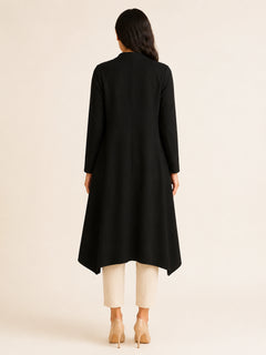 Back view of WAROODI Liana Flow Coat in midnight black with ankle-length modest outerwear silhouette