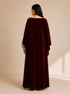 Malika Velvet Kaftan by WAROODI back view, full-length deep burgundy luxury kaftan with fluid velvet drape, modest silhouette, wide sleeves, and timeless elegant finish.