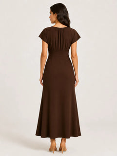 Back view of WAROODI Mira Soft-Flare Maxi in cocoa brown with full-length A-line silhouette