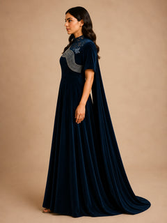 Prestige Midnight Blue Velvet Gown by WAROODI side view, midnight blue velvet modest gown with graceful full-length drape, short structured sleeves, subtle sheen, and refined eveningwear silhouette.