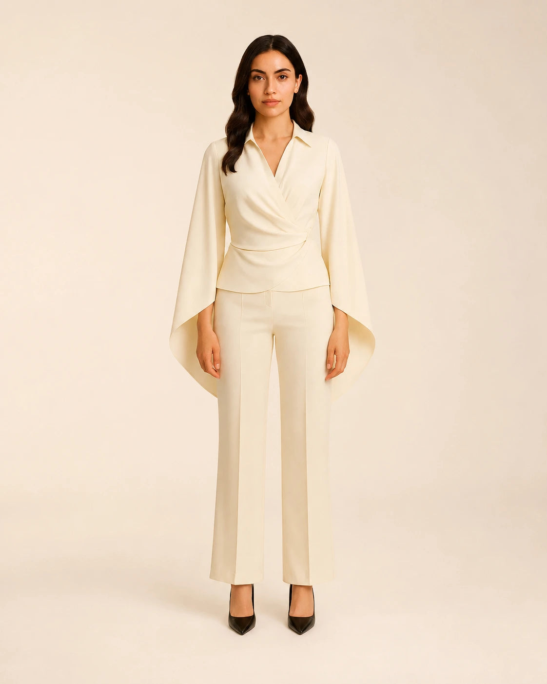 WAROODI Valeria Cape Co-ord Set in ivory cream with wrap-front cape top and straight-leg trousers, front view