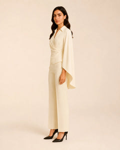 WAROODI Valeria Cape Co-ord Set with flowing cape sleeves and tailored trousers, side view
