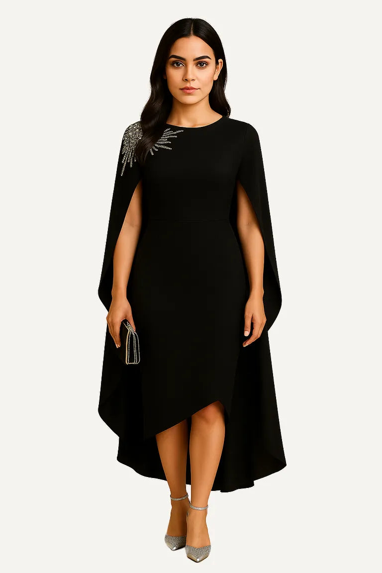 WAROODI Serene Cape Evening Gown in Black – front view, premium crepe, embellished shoulder, high-low hem.