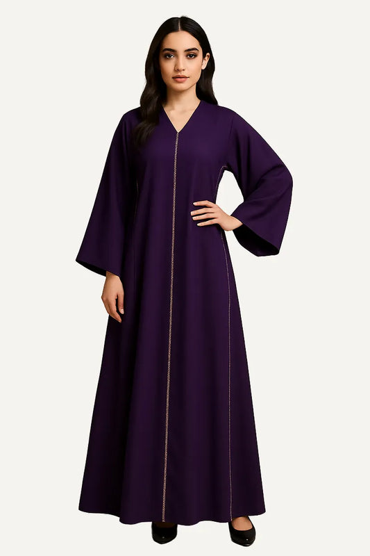 WAROODI Zahra Line Modest Kaftan in Plum Purple – front view with gold-line trim, flowing wide sleeves, premium crepe fabric.